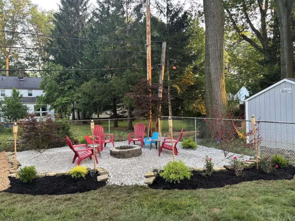 Custom stone fire pit installation by DG Picture Perfect Landscaping in Curryahoga and Geauga County, Ohio