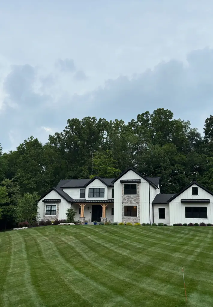 Freshly mowed and striped residential lawn maintained by DG Picture Perfect Landscaping in Cuyahoga County Ohio