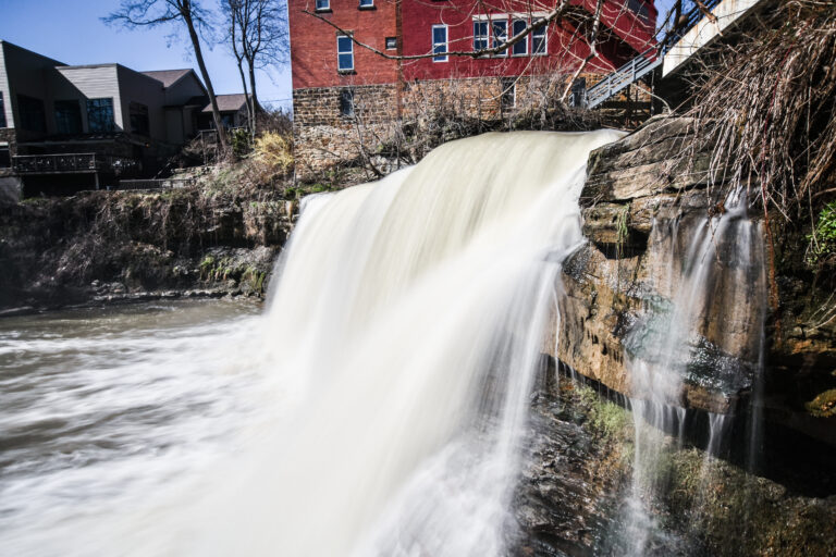 The downtown Chagrin Falls waterfall beside the historic red-brick mill building